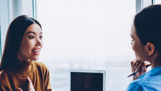 women_talking_at_work